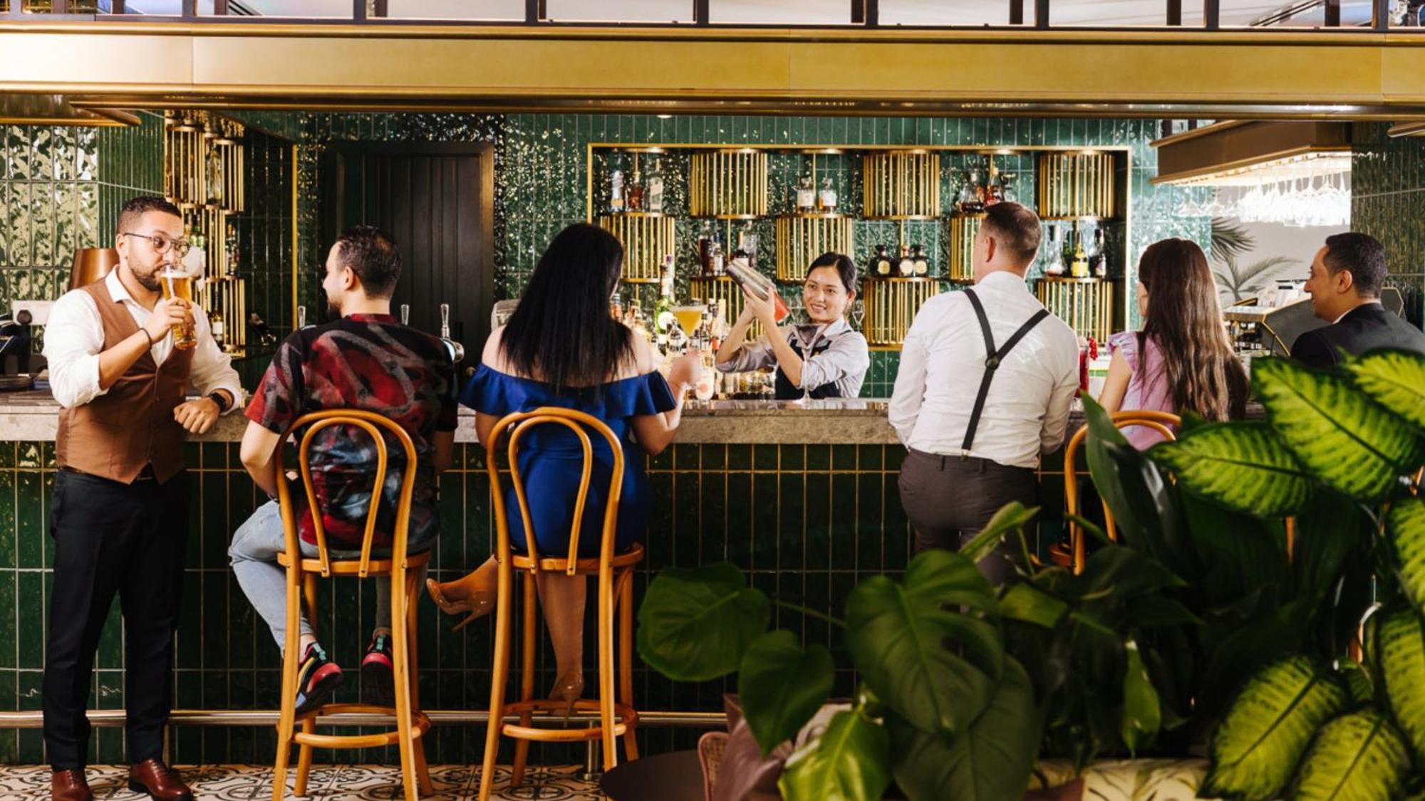 voco Dubai, an IHG Hotel Esterno foto The bar at the 1930s-themed restaurant and bar, The Jungle City, in Bangkok, Thailand.
